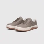 genuine leather casual sneakers breathable chunky sole in gray, front 45-degree view of the pair on a light gray background