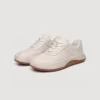 genuine leather casual sneakers breathable chunky sole in white, front 45-degree view of the pair on a light gray background