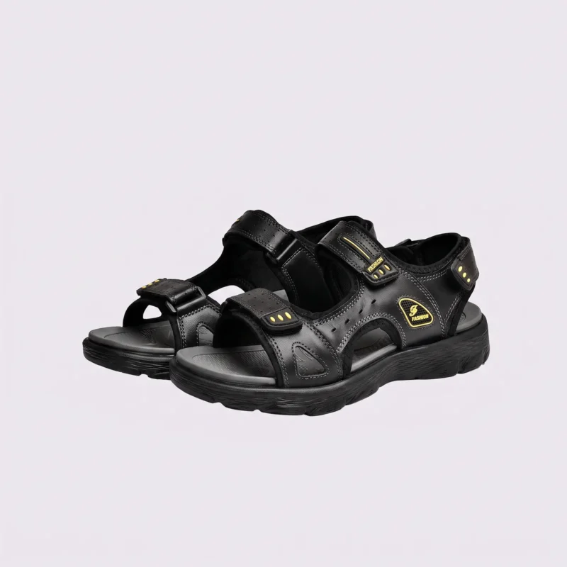 genuine leather men's beach slide sandals - soft sole thick platform outdoor wading slides in black, front 45-degree view of the pair on a light gray background