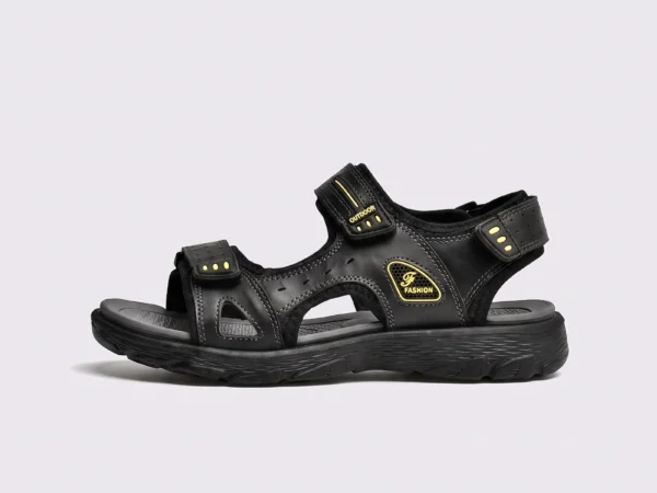 genuine leather men's beach slide sandals - soft sole thick platform outdoor wading slides in black, left side profile view on a light gray background