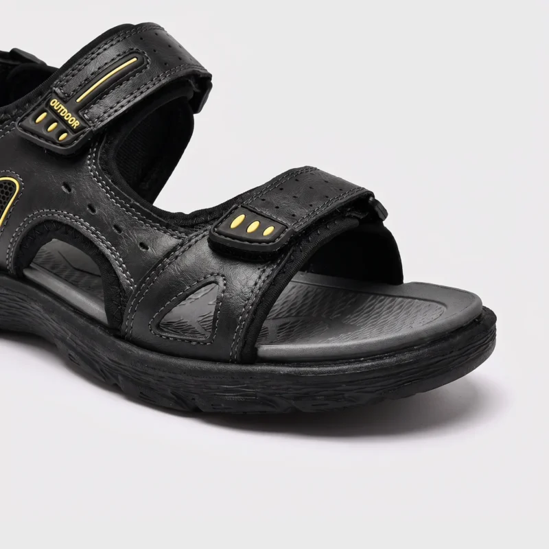 genuine leather men's beach slide sandals - soft sole thick platform outdoor wading slides in black, close-up view of the toe on a light gray background