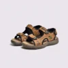 genuine leather men's beach slide sandals - soft sole thick platform outdoor wading slides in brown, front 45-degree view of the pair on a light gray background