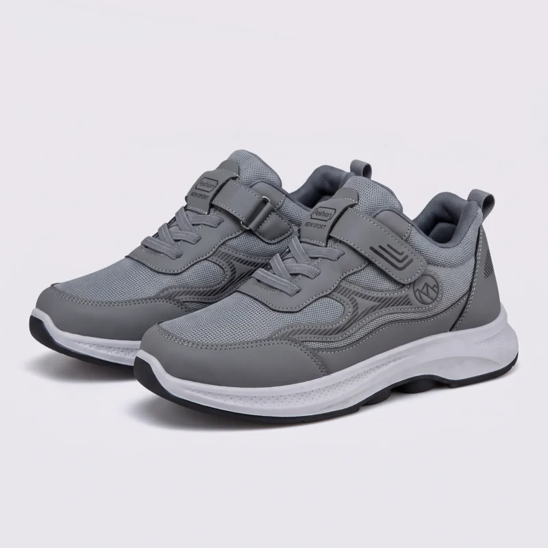 hook-and-loop walking sneakers slip-on soft sole non-slip comfort shoes for everyday walking in gray, front 45-degree view of the pair on a light gray background