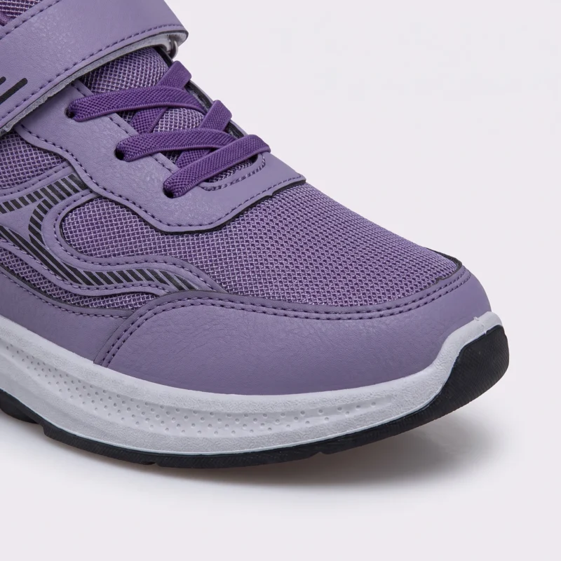 hook-and-loop walking sneakers slip-on soft sole non-slip comfort shoes for everyday walking, close-up view of the toe on a light gray background