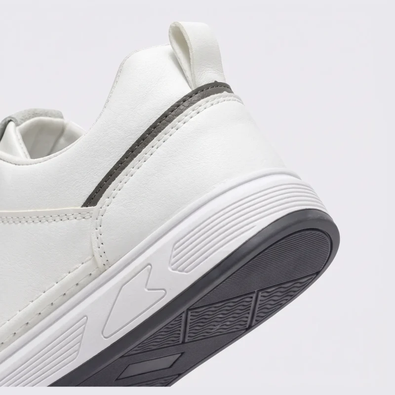 men's perforated slip-on sneakers - breathable knit casual walking shoes with cushioned sole in white, close-up view of the heel on a light gray background
