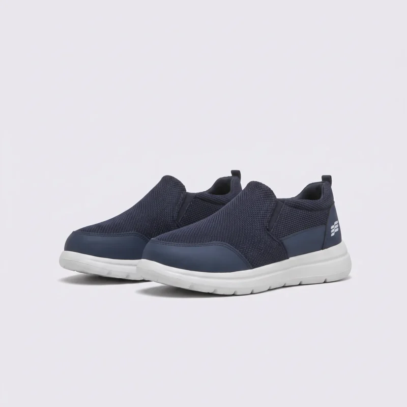 men's slip-on mesh casual sneakers - lace-free lightweight shoes with a cushioned thick sole in navy, front 45-degree view of the pair on a light gray background