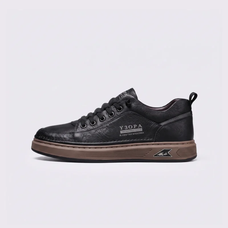 smooth-grain lace-up court sneakers - low-top casual shoes with a flat one-piece sole in black, left side profile view on a light gray background