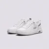 smooth-grain lace-up court sneakers - low-top casual shoes with a flat one-piece sole in white, front 45-degree view of the pair on a light gray background