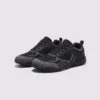 wide-toe knit trail sneakers - flexible thickened rubber outsole with a cushioned insole in black, front 45-degree view of the pair on a light gray background