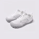 wide-toe knit trail sneakers - flexible thickened rubber outsole with a cushioned insole in white, front 45-degree view of the pair on a light gray background