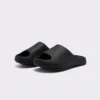 negative heel arch support slide sandals - thick platform one-piece eva slides for women in black, front 45-degree view of the pair on a light gray background