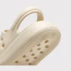 negative heel arch support slide sandals - thick platform one-piece eva slides for women in black, close-up view of the heel on a light gray background