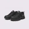 Pair of black AZEKA outdoor trail hiking shoes, front 45 degree view, thick black lug outsole on light gray background