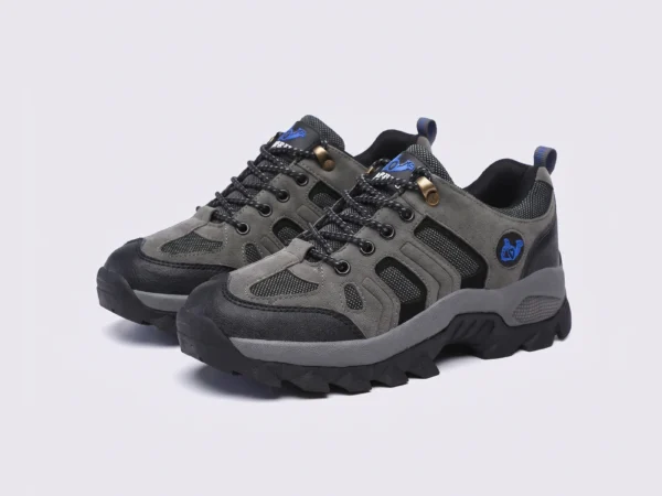 Pair of olive green AZEKA outdoor trail hiking shoes, front 45 degree view, thick black lug outsole on light gray background