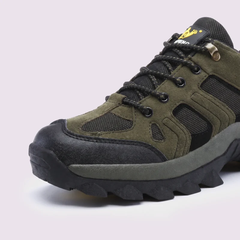 Close-up of the reinforced rubber toe cap of olive green AZEKA trail hiking shoes