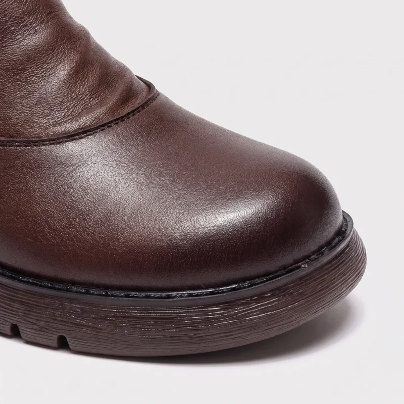 retro platform ankle boots chunky sole side zip warm fleece lined casual short boots in black, close-up view of the toe on a light gray background