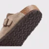 two-strap buckle casual sandals - adjustable double-strap slides with cushioned cork footbed for men and women in brown, close-up view of the heel on a light gray background