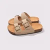 two-strap buckle casual sandals - adjustable double-strap slides with cushioned cork footbed for men and women in cream, front 45-degree view of the pair on a light gray background