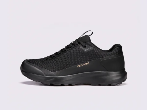 unisex lightweight hiking shoes - breathable outdoor walking & trail shoes, couple style in black, left side profile view on a light gray background
