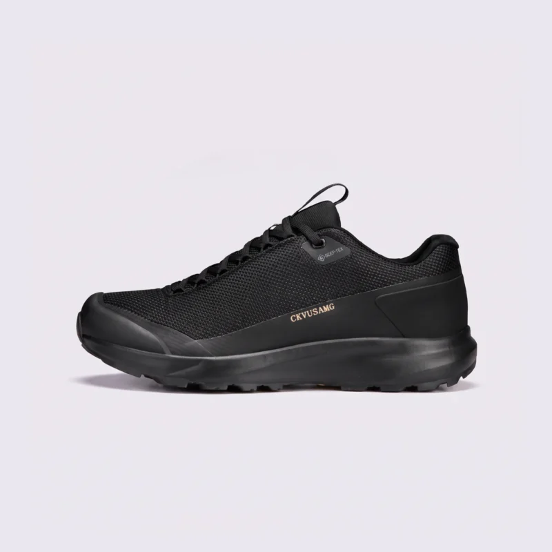 unisex lightweight hiking shoes - breathable outdoor walking & trail shoes, couple style in black, left side profile view on a light gray background