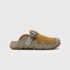 unisex wave-sole closed-toe clog slippers - suede slip-on mules with adjustable webbing strap and thick cushioned sole, left side profile view on a light gray background