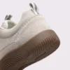unisex wide-toe german trainer shoes - retro lace-up low-top sneakers in beige, close-up view of the heel on a light gray background