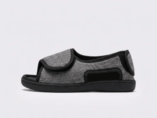 Side left view of gray AZEKA wide fit slippers with adjustable hook and loop strap