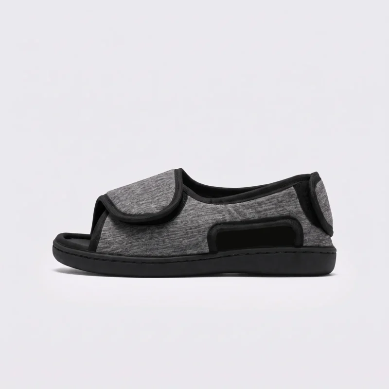 Side left view of gray AZEKA wide fit slippers with adjustable hook and loop strap