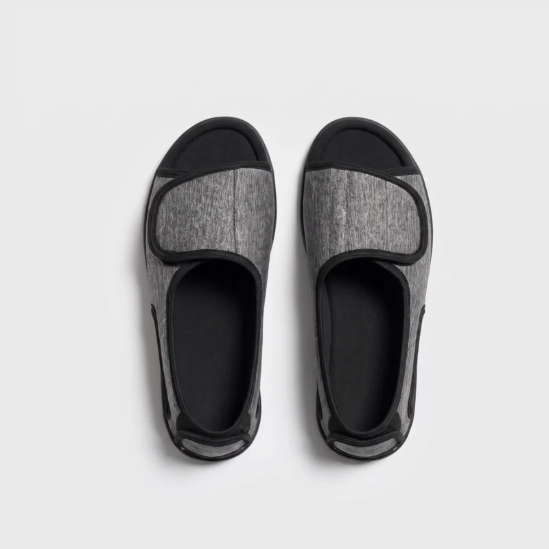 Top view of a pair of gray AZEKA wide fit casual slippers showing hook and loop straps