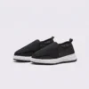 wide fit soft canvas slip-on shoes breathable mesh roomy toe everyday comfort in black, front 45-degree view of the pair on a light gray background