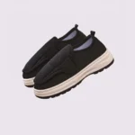 wide fit soft canvas slip-on shoes breathable mesh roomy toe everyday comfort, front 45-degree view of the pair on a light gray background
