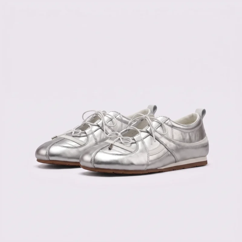 women's silver mary jane flats - soft sole slip-on ballet shoes with hidden 3.5 cm heel in silver, front 45-degree view of the pair on a light gray background