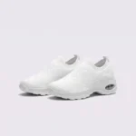 slip-on quilted sock sneakers - lace-free everyday shoes with a cushioned thick sole and heel window in white, front 45-degree view of the pair on a light gray background