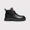 chunky sole leather ankle boots in black, left side profile view on a light gray background