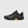 leather outdoor hiking sneakers in black, left side profile view on a light gray background