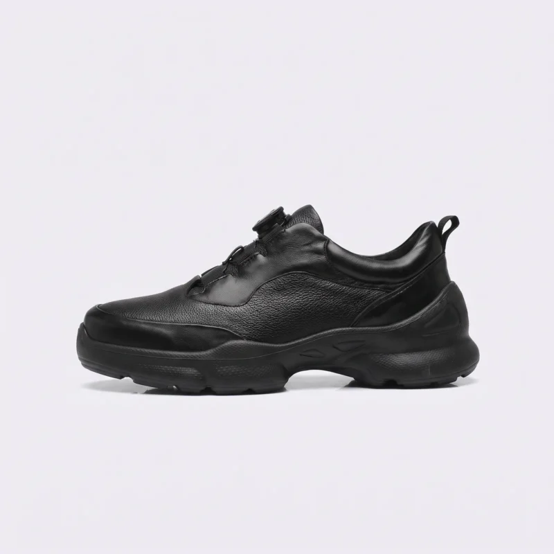 lightweight boa walking sneakers in black, left side profile view on a light gray background