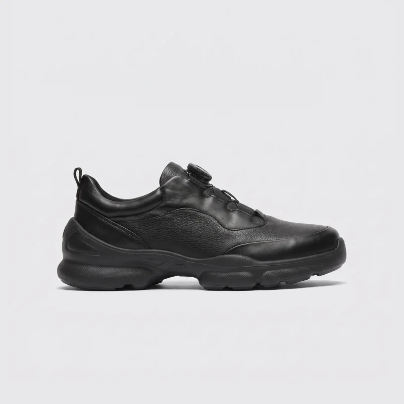lightweight boa walking sneakers in black, right side profile view on a light gray background