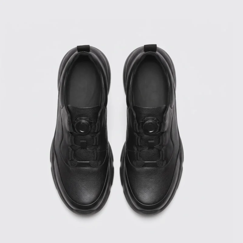 lightweight boa walking sneakers in black, top-down view of the pair on a light gray background