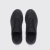 men's waterproof trail running shoes in black, top-down view of the pair on a light gray background