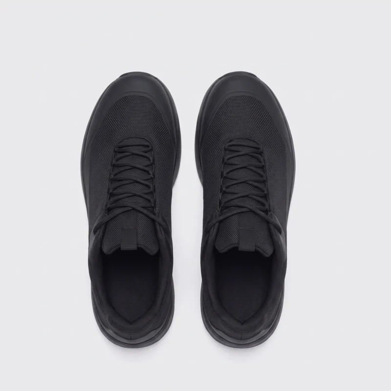men's waterproof trail running shoes in black, top-down view of the pair on a light gray background