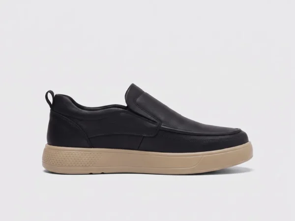 slip-on leather casual shoes in black, left side profile view on a light gray background