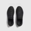 waterproof leather hiking sneakers in black, top-down view of the pair on a light gray background