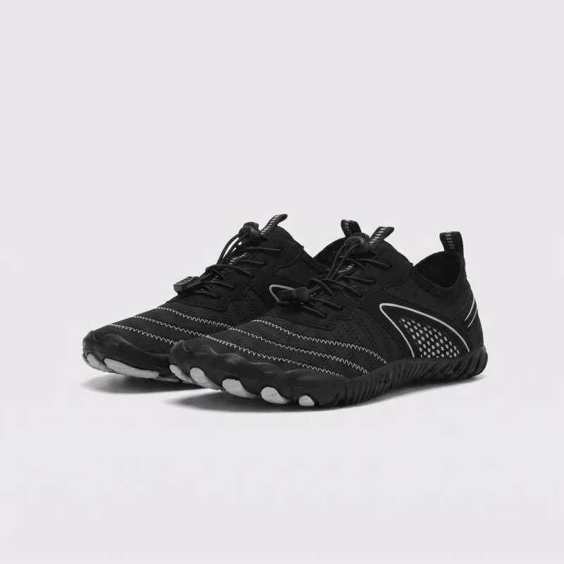 barefoot aqua water shoes quick-dry for beach wading hiking surfing in black, front 45-degree view of the pair on a light gray background