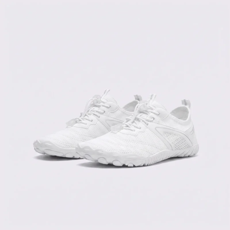 barefoot aqua water shoes quick-dry for beach wading hiking surfing in white, front 45-degree view of the pair on a light gray background