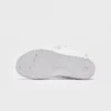 barefoot aqua water shoes quick-dry for beach wading hiking surfing in white, outsole tread view on a light gray background