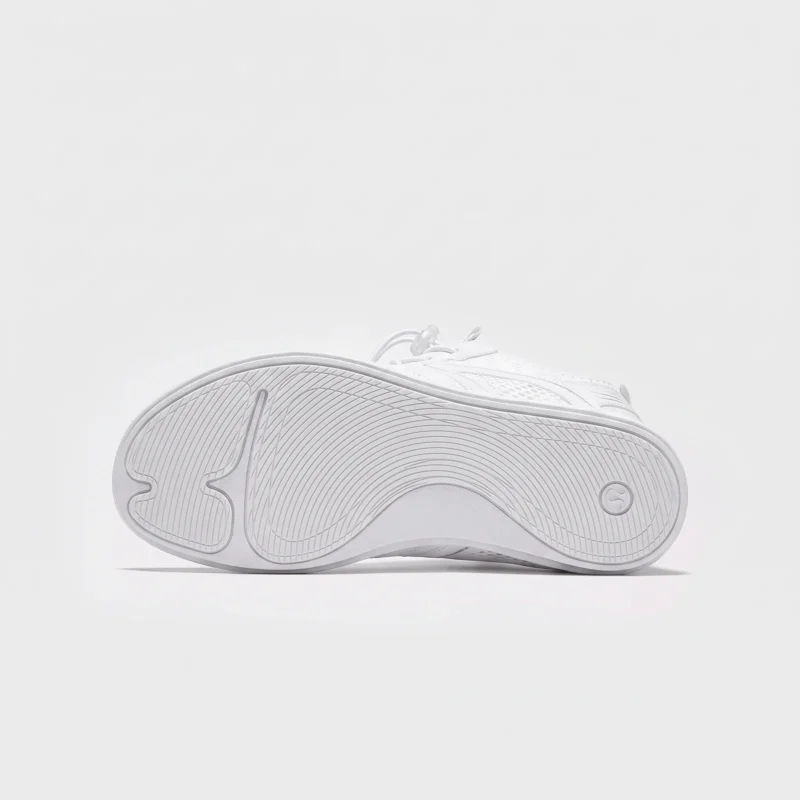 barefoot aqua water shoes quick-dry for beach wading hiking surfing in white, outsole tread view on a light gray background