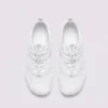 barefoot aqua water shoes quick-dry for beach wading hiking surfing in white, top-down view of the pair on a light gray background