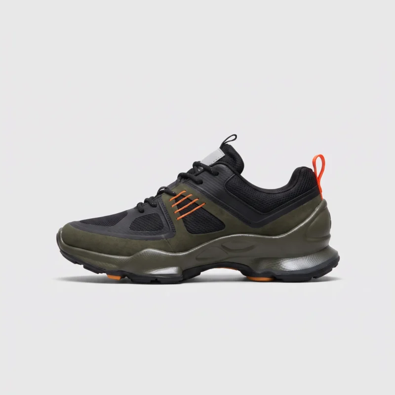 breathable mesh running sneakers lightweight chunky sole casual outdoor shoes in green, left side profile view on a light gray background