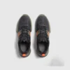 breathable mesh running sneakers lightweight chunky sole casual outdoor shoes in green, top-down view of the pair on a light gray background