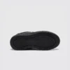 genuine leather casual shoes breathable lightweight non-slip walking sneakers in black, outsole tread view on a light gray background